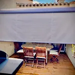 Mezzanine/jardin/terrasse Village Naturiste アパート